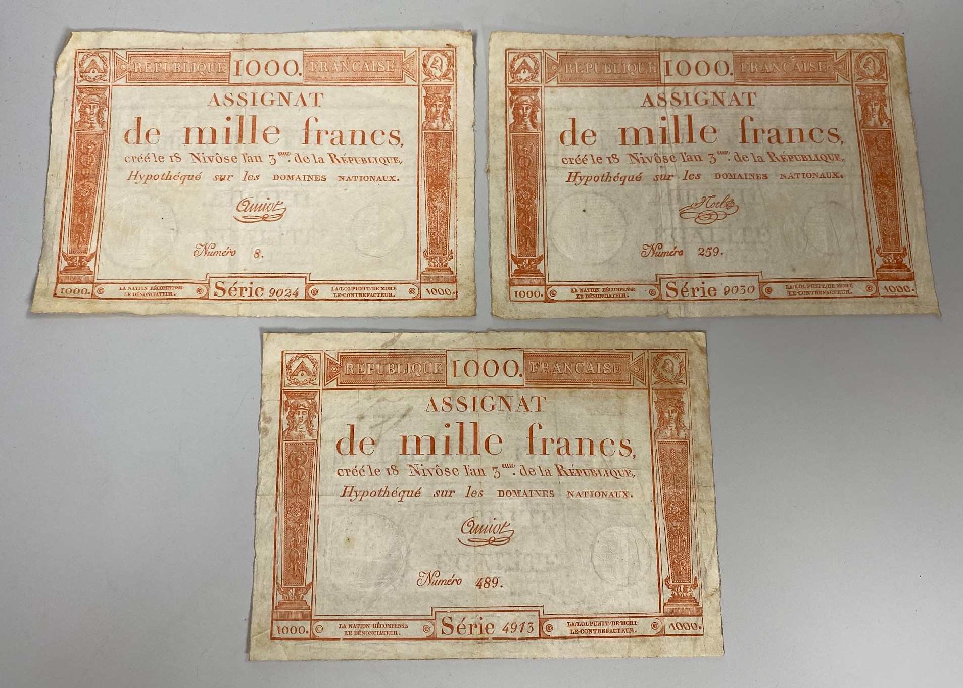 French Revolutionary banknotes, Republic Francaise, three Assignat de mille francs 1000 Francs 18 Nivose An III - 1795, Serie 9024, Numero 8, Serie 9030, Numero 259 and Serie 4913, Numero 489, watermarks (3)